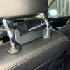 Ekipuotės laikiklis automobiliui „Headrest Mount“